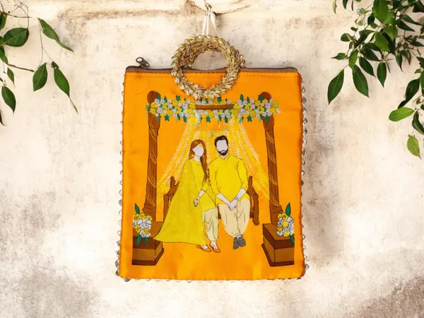 Haldi_Themed_Potli_Bag_With_Designer_Handle