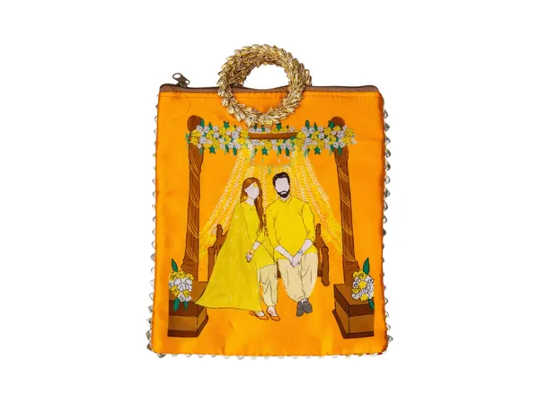 Haldi_Themed_Potli_Bag_With_Designer_Handle
