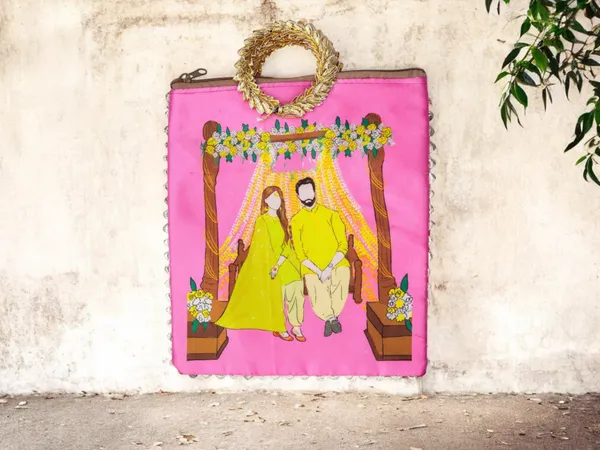 Haldi_Themed_Potli_Bag_With_Designer_Handle