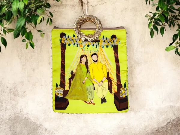 Haldi_Themed_Potli_Bag_With_Designer_Handle