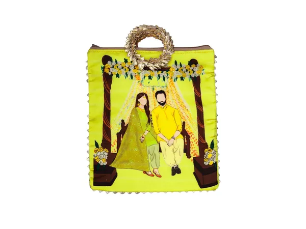 Haldi_Themed_Potli_Bag_With_Designer_Handle