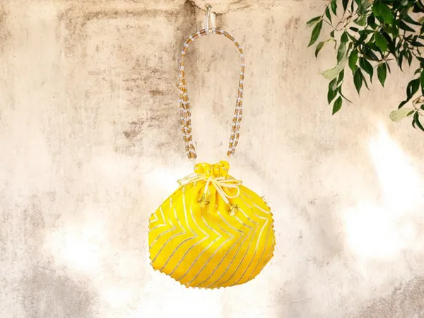 Bandhani_Style_Round_Potli_Bag_With_Golden_Handle
