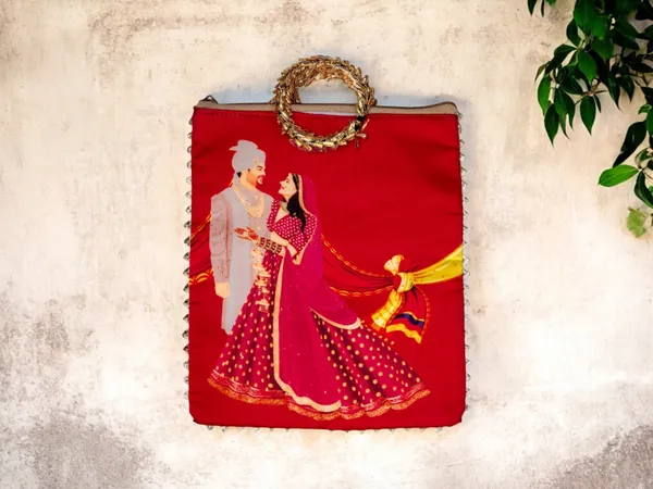 Vivah_Themed_Potli_Bag_With_Designer_Handle_-_Red