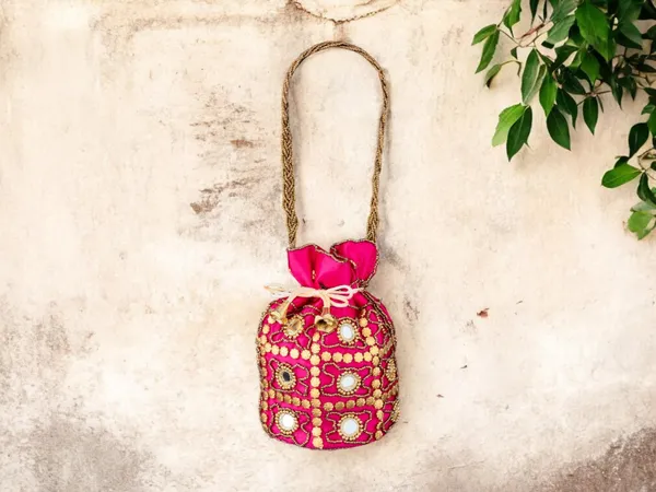 Royal_Embroidered_Potli_Bag_With_Mirror_Work_And_Braided_Handle