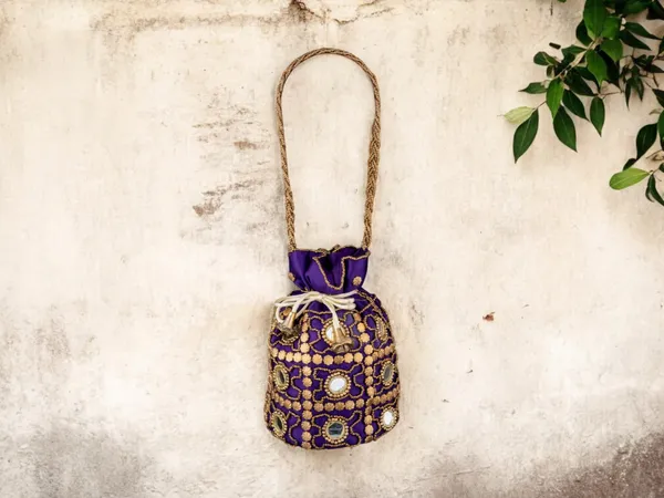 Royal_Embroidered_Potli_Bag_With_Mirror_Work_And_Braided_Handle