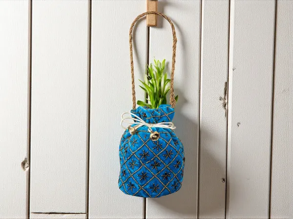 Fuchsia_Embroidered_Potli_Bag_With_Golden_Beadwork_&_Braided_Handle