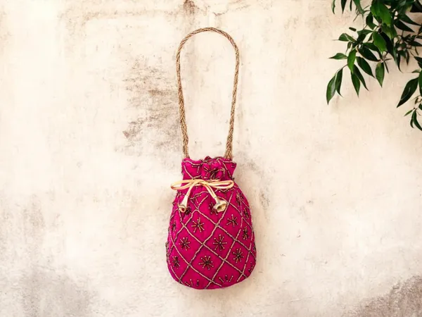 Fuchsia_Embroidered_Potli_Bag_With_Golden_Beadwork_&_Braided_Handle_-_Pink