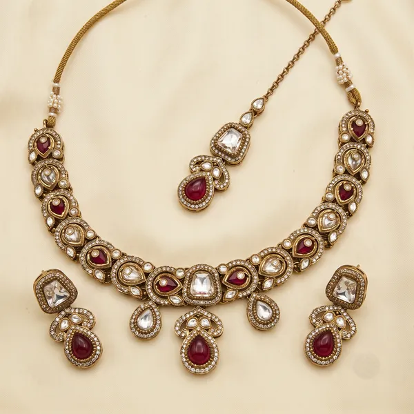 Antique_Gold-Plated_Kundan_Necklace_Set_with_Ruby_Pink_Stones_&_Maang_Tikka