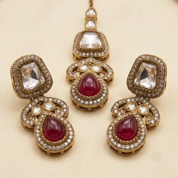 Antique_Gold-Plated_Kundan_Necklace_Set_with_Ruby_Pink_Stones_&_Maang_Tikka