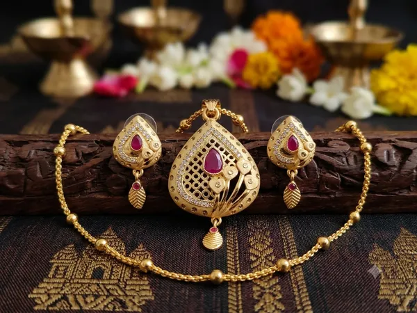 Elegant_Gold-Plated_Matte_Finish_Ruby_Pendant_Set_with_Matching_Earrings