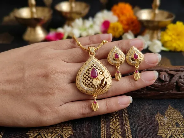 Elegant_Gold-Plated_Matte_Finish_Ruby_Pendant_Set_with_Matching_Earrings