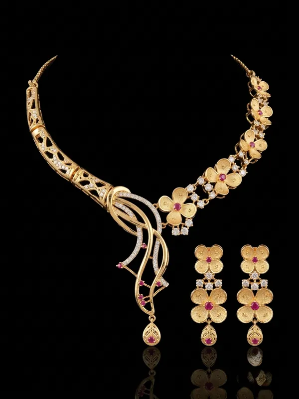The_Flora_Cascade_Asymmetric_Collar_Necklace_&_Dangler_Earrings_in_Matte_Gold_with_Ruby_Blossoms_and_Micro-Pave_AD_|_MAS_JEWELLERS