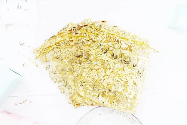 DNY_�??_50_Pcs_Potli_Bags,_Organza_Pouches_7X9_Inches_with_Drawstring_Small_Potli_Bags_for_Return_Gifts_for_Wedding|_Party_|Baby_Shower|_Dry_Fruit_Pouches_(Gold_Flower)