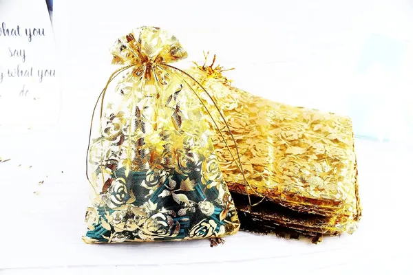 DNY_�??_50_Pcs_Potli_Bags,_Organza_Pouches_7X9_Inches_with_Drawstring_Small_Potli_Bags_for_Return_Gifts_for_Wedding|_Party_|Baby_Shower|_Dry_Fruit_Pouches_(Gold_Flower)