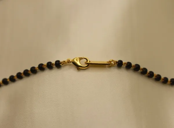 Gold_Plated_Short_Single-Strand_Classic_Mangalsutra_For_Women_(200_mg_Gold)