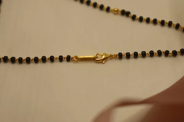 Gold_Plated_Petite_Charm_Single_Line_Mangalsutra_For_Women_(200_mg_Gold)