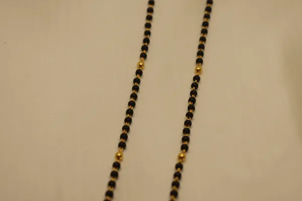 Gold_Plated_Petite_Charm_Single_Line_Mangalsutra_For_Women_(200_mg_Gold)