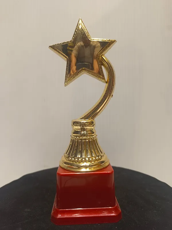 Golden_Plastic_Trophy_For_Corporate_Award_,_Star_Trophy_,_Sports_Trophy