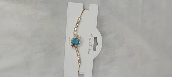 Azure_Spark_Charm_Bracelet_(Variable-1)