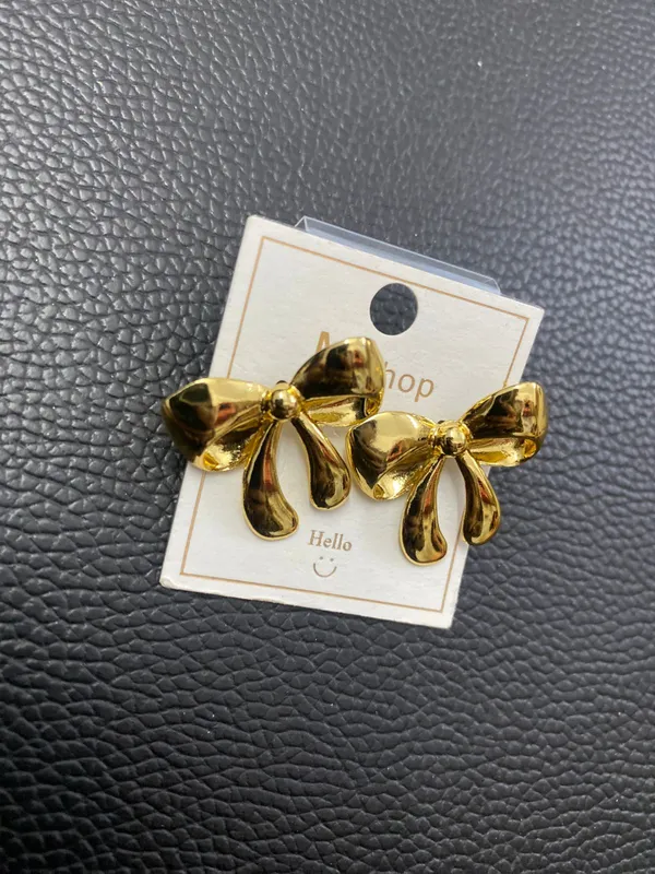 Golden_Bow_Drop_Earrings
