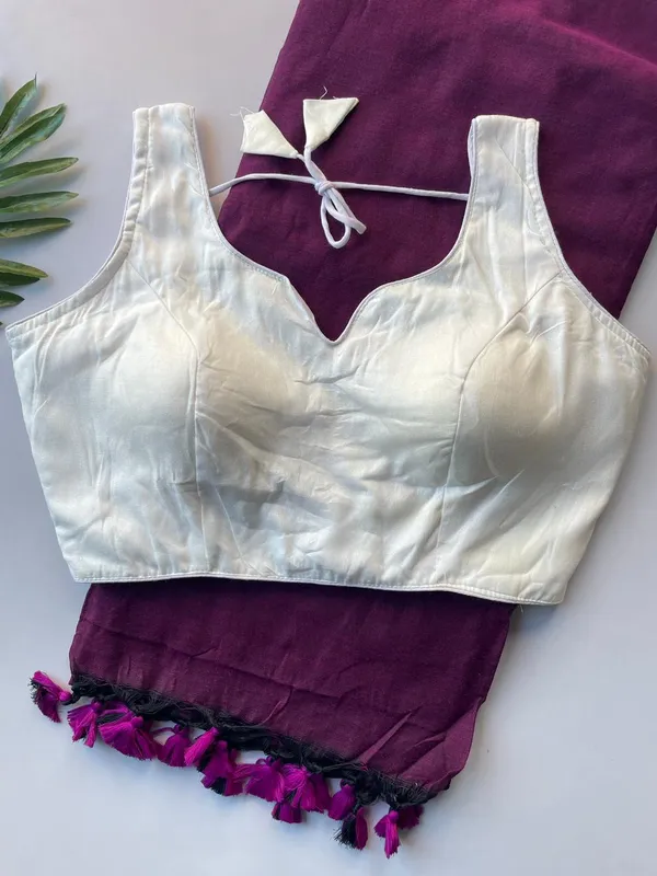 Highlights_the_free-spirited,_modern_vibe_of_the_outfit_with_the_tassels