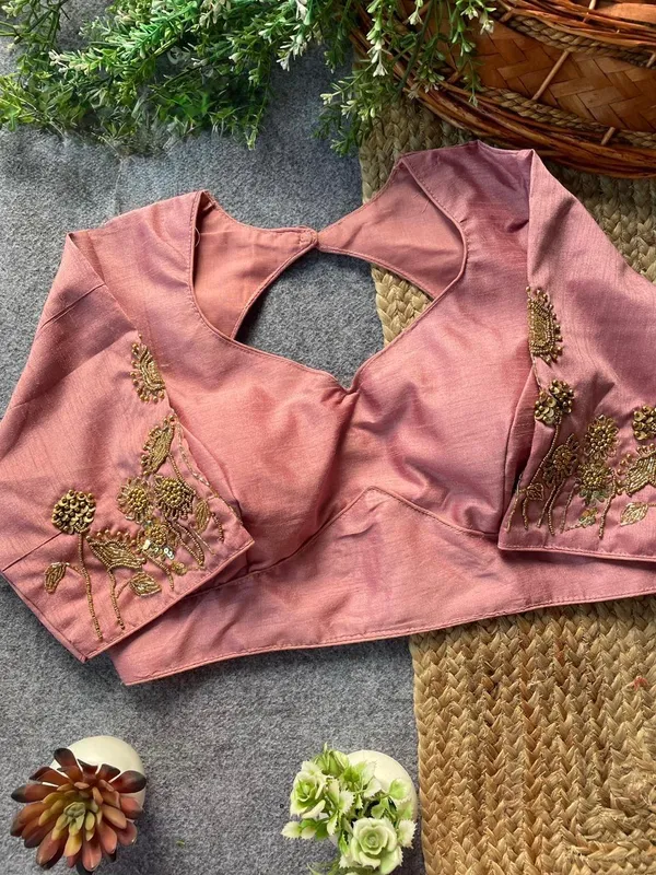 Intricate_floral_embroidery_with_a_chic_back_cut-out,_blending_timeless_tradition_and_modern_elegance
