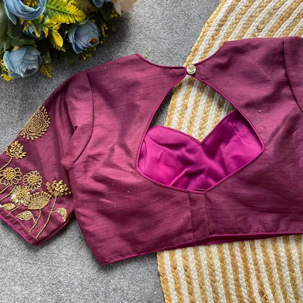Intricate_floral_embroidery_with_a_chic_back_cut-out,_blending_timeless_tradition_and_modern_elegance