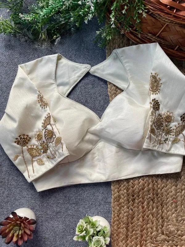 Intricate_floral_embroidery_with_a_chic_back_cut-out,_blending_timeless_tradition_and_modern_elegance