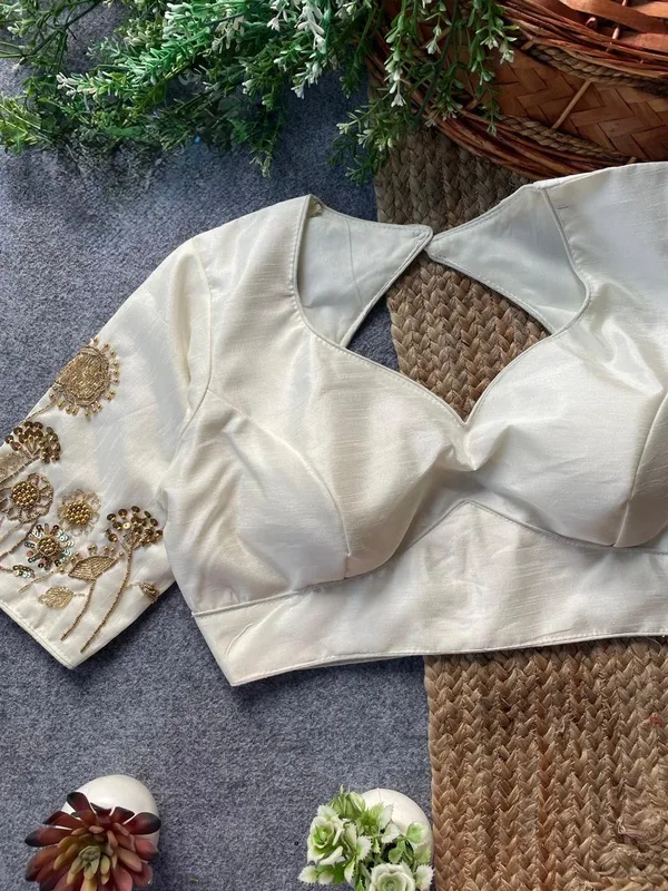 Intricate_floral_embroidery_with_a_chic_back_cut-out,_blending_timeless_tradition_and_modern_elegance