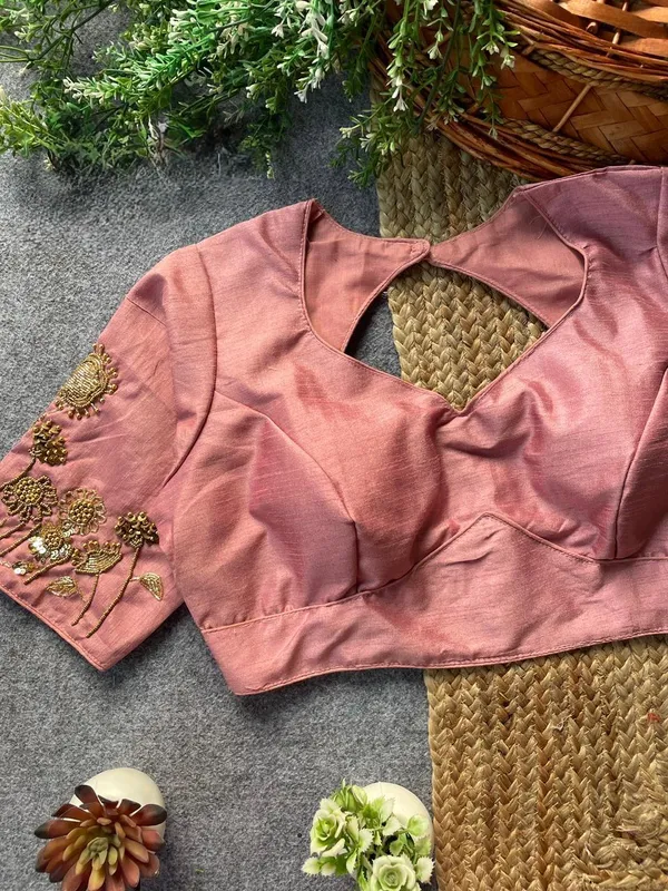 Intricate_floral_embroidery_with_a_chic_back_cut-out,_blending_timeless_tradition_and_modern_elegance