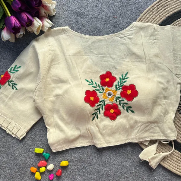 Patch_Work_Designer_Khadi_Handwork_Blouse_is_crafted_from_pure_khadi_cotton_and_features_intricate_handwork._