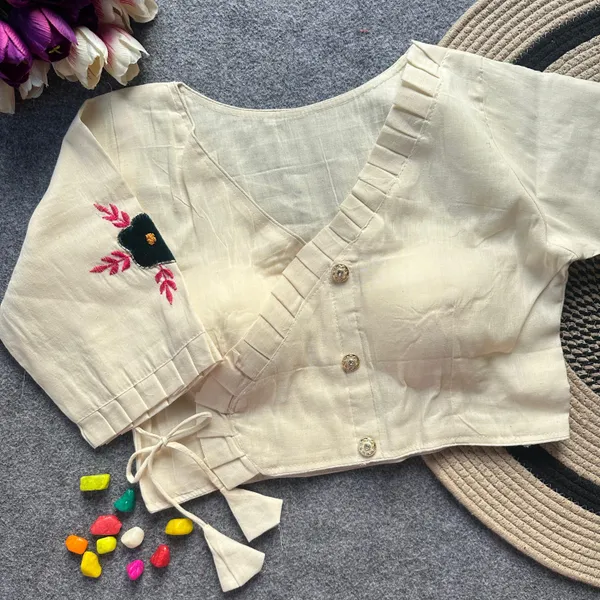 Patch_Work_Designer_Khadi_Handwork_Blouse_is_crafted_from_pure_khadi_cotton_and_features_intricate_handwork._