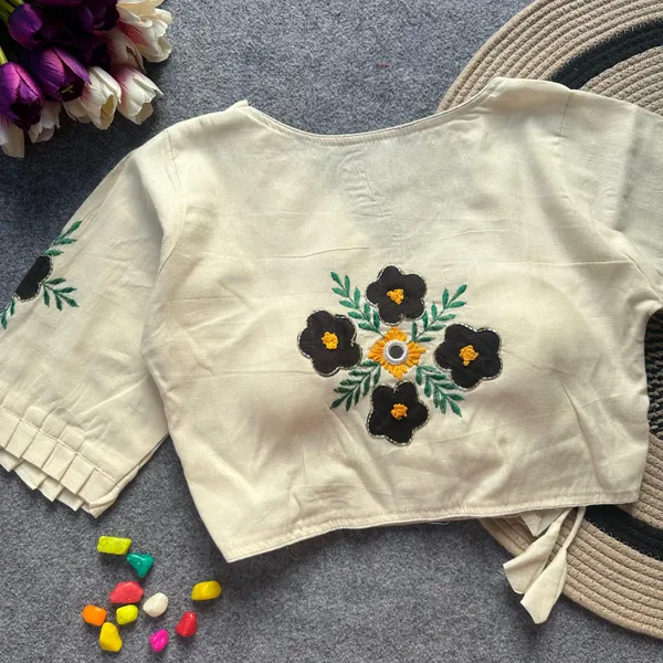 Patch_Work_Designer_Khadi_Handwork_Blouse_is_crafted_from_pure_khadi_cotton_and_features_intricate_handwork._