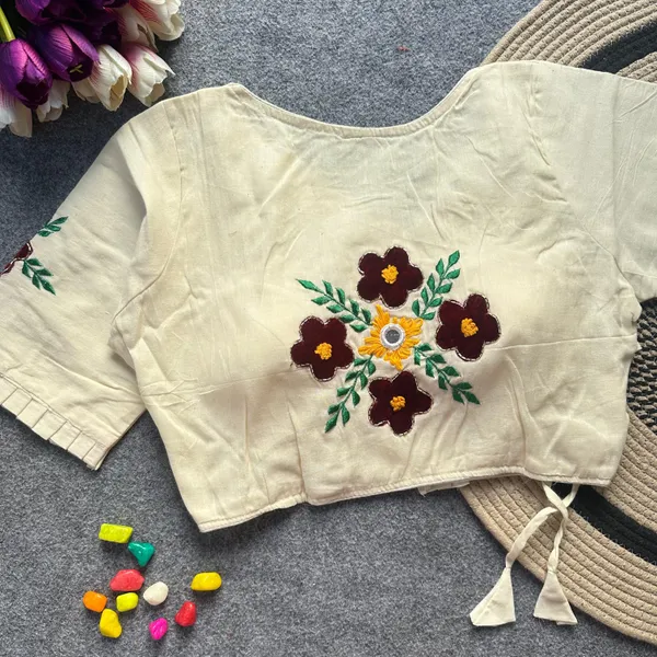 Patch_Work_Designer_Khadi_Handwork_Blouse_is_crafted_from_pure_khadi_cotton_and_features_intricate_handwork._