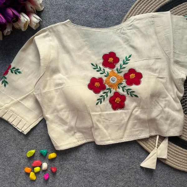 Patch_Work_Designer_Khadi_Handwork_Blouse_is_crafted_from_pure_khadi_cotton_and_features_intricate_handwork._