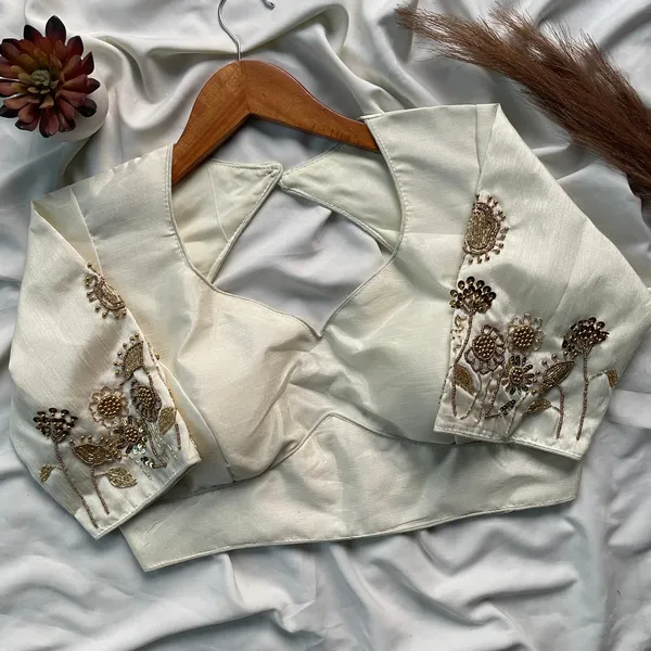 This_is_a_pure_Milan_silk_blouse_with_heavy_handwork_embroidery.