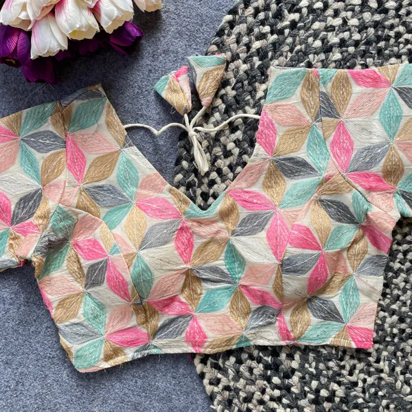 This_is_a_pure_camric_cotton_blouse_with_multi-sequence_thread_and_embroidery_work