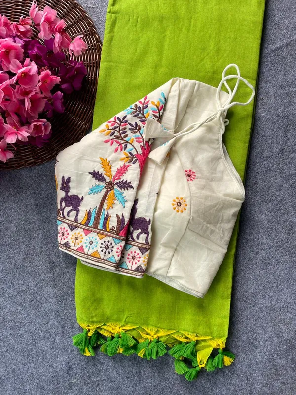 This_is_a_pure_khadi_cotton_blouse_with_multi-thread_embroidery,_paired_with_saree.