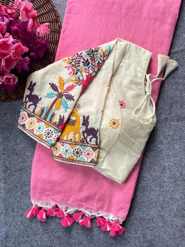 This_is_a_pure_khadi_cotton_blouse_with_multi-thread_embroidery,_paired_with_saree.