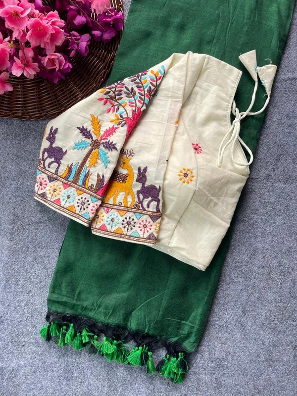 This_is_a_pure_khadi_cotton_blouse_with_multi-thread_embroidery,_paired_with_saree.