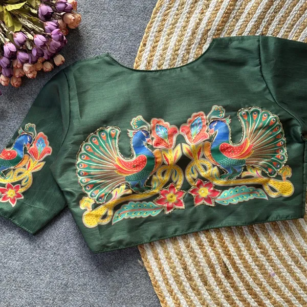 This_is_a_pure_silk_blouse_with_a_peacock_and_floral_print_and_intricate_antique_handcrafted_work