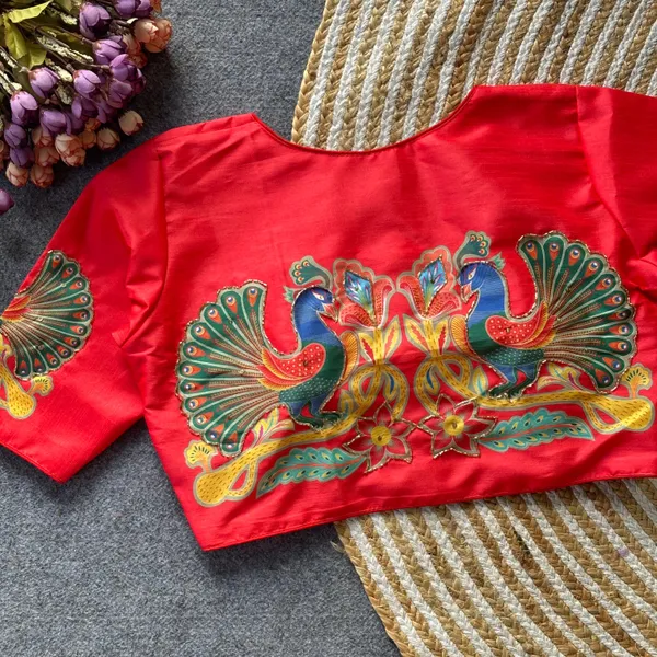 This_is_a_pure_silk_blouse_with_a_peacock_and_floral_print_and_intricate_antique_handcrafted_work