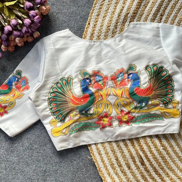 This_is_a_pure_silk_blouse_with_a_peacock_and_floral_print_and_intricate_antique_handcrafted_work
