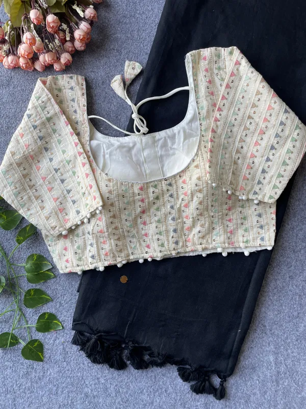 Where_subtle_patterns_meet_timeless_style,_paired_with_a_blouse_that_stands_out.