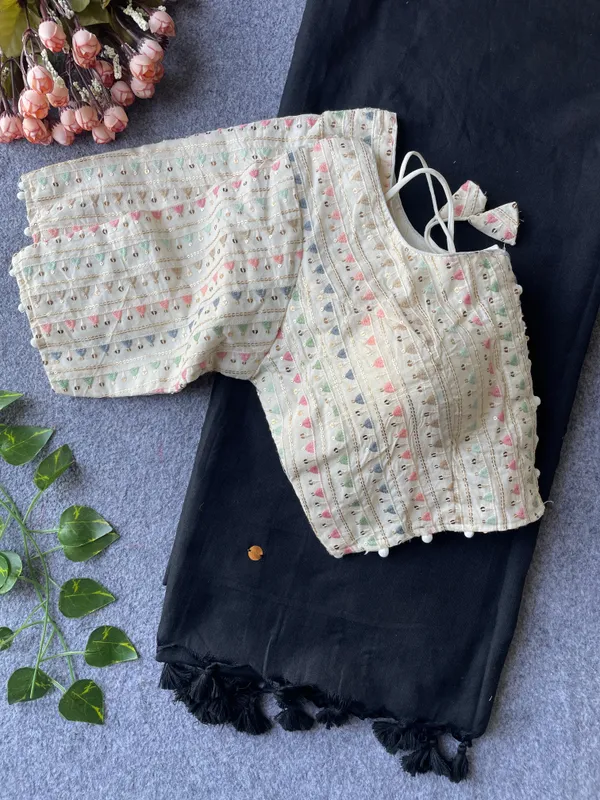 Where_subtle_patterns_meet_timeless_style,_paired_with_a_blouse_that_stands_out.