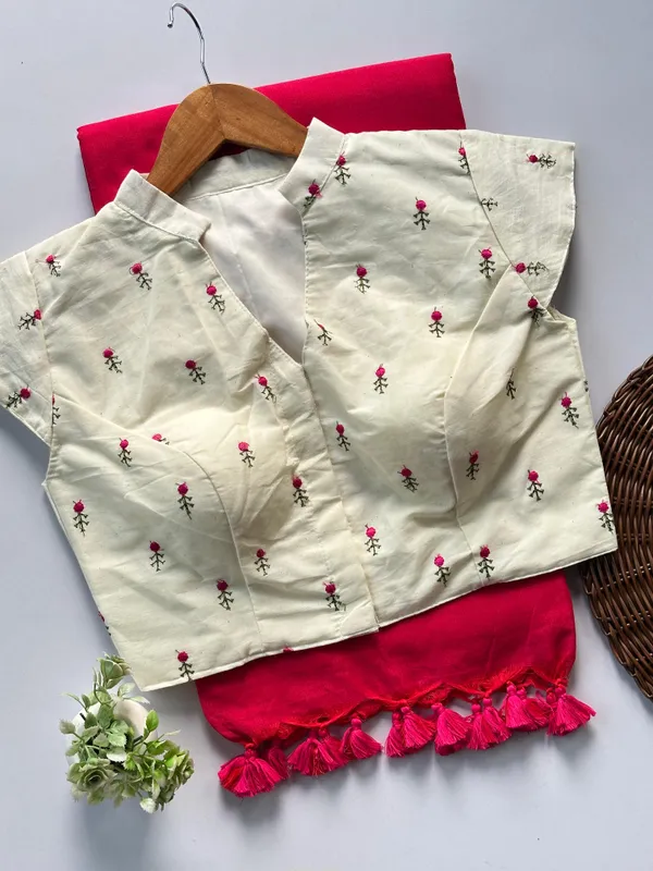 a_flattering_V-neck_blouse_is_designed_to_elevate_your_festive_saree_styling_with_subtle_elegance