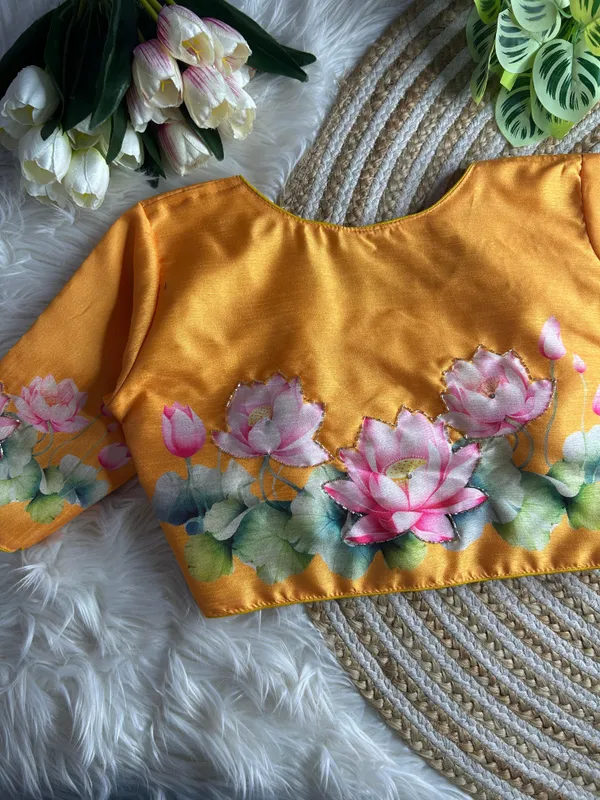 print_and_handwork_of_pink_lotus_flowers_and_green_leaves_across_the_back_and_sleeves