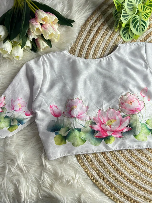 print_and_handwork_of_pink_lotus_flowers_and_green_leaves_across_the_back_and_sleeves