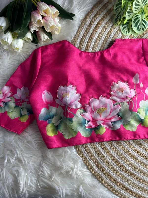 print_and_handwork_of_pink_lotus_flowers_and_green_leaves_across_the_back_and_sleeves