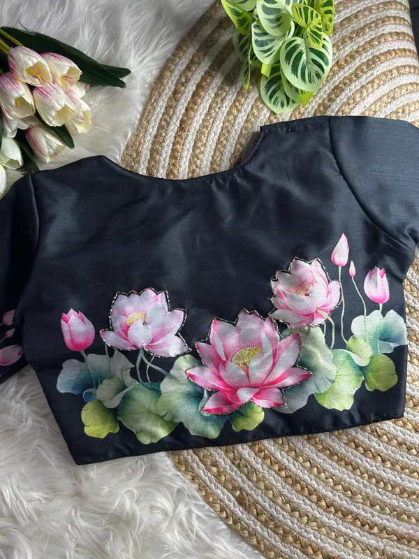 print_and_handwork_of_pink_lotus_flowers_and_green_leaves_across_the_back_and_sleeves